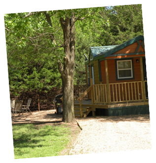 Deluxe cabin with propane grill and fire pit.